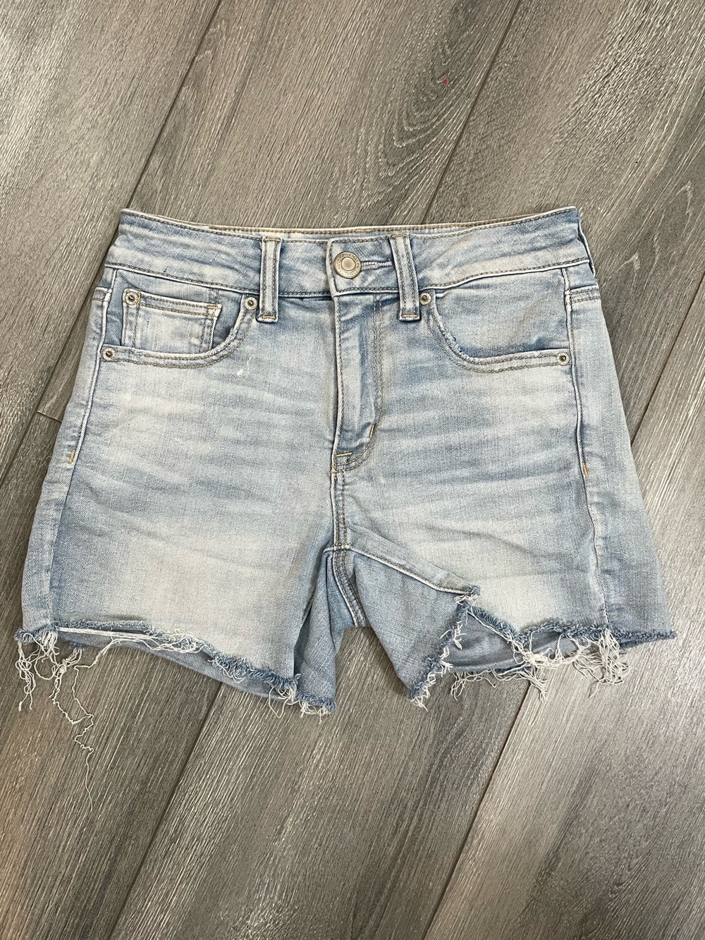 AEO Hi Rise Shortie with Raw Hem Light Blue Wash size 2